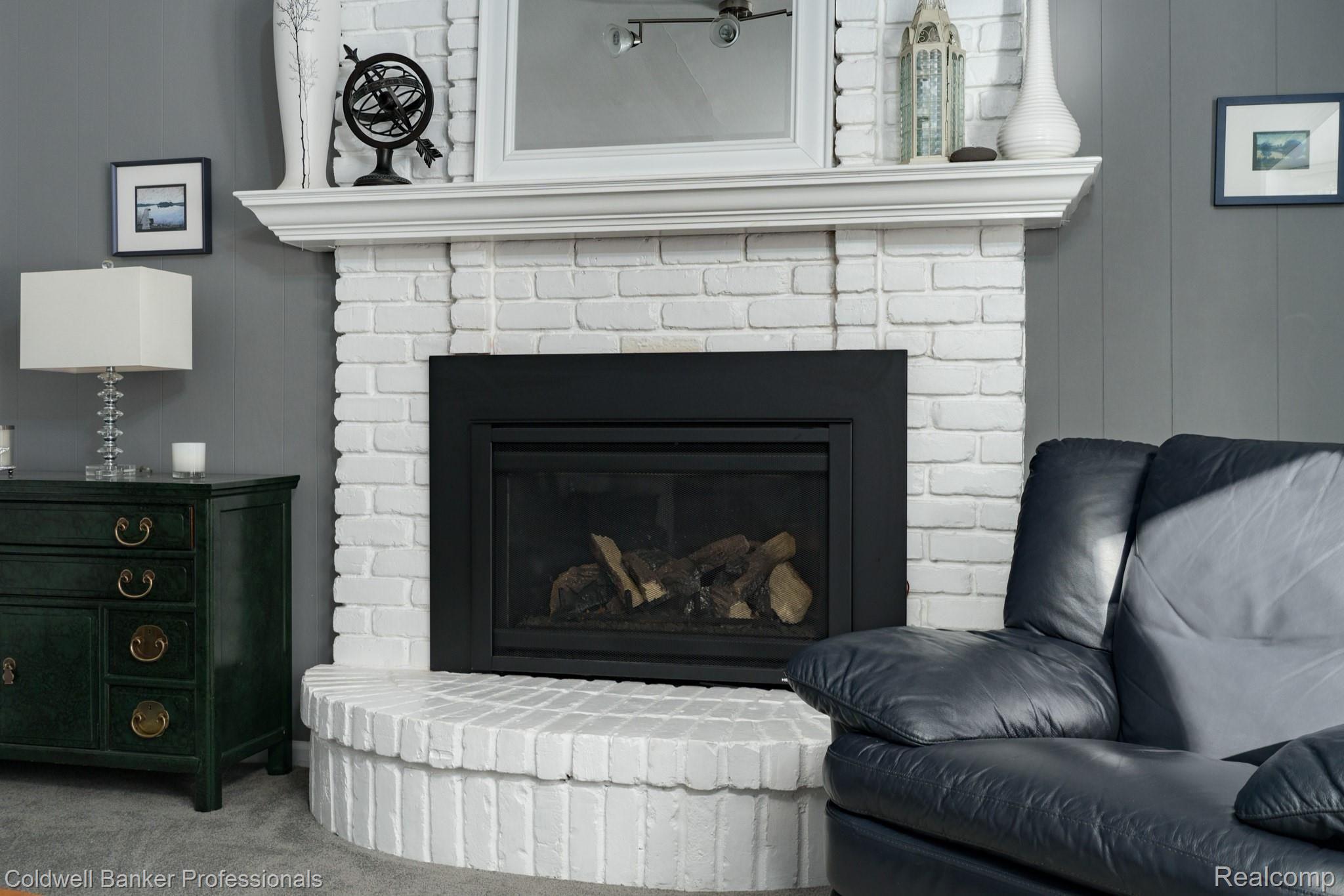 1362 West Fairview Lane Rochester, MI 48306 - Photo 17 of 35 Gas fireplace with blower really heats up this wonderful room!