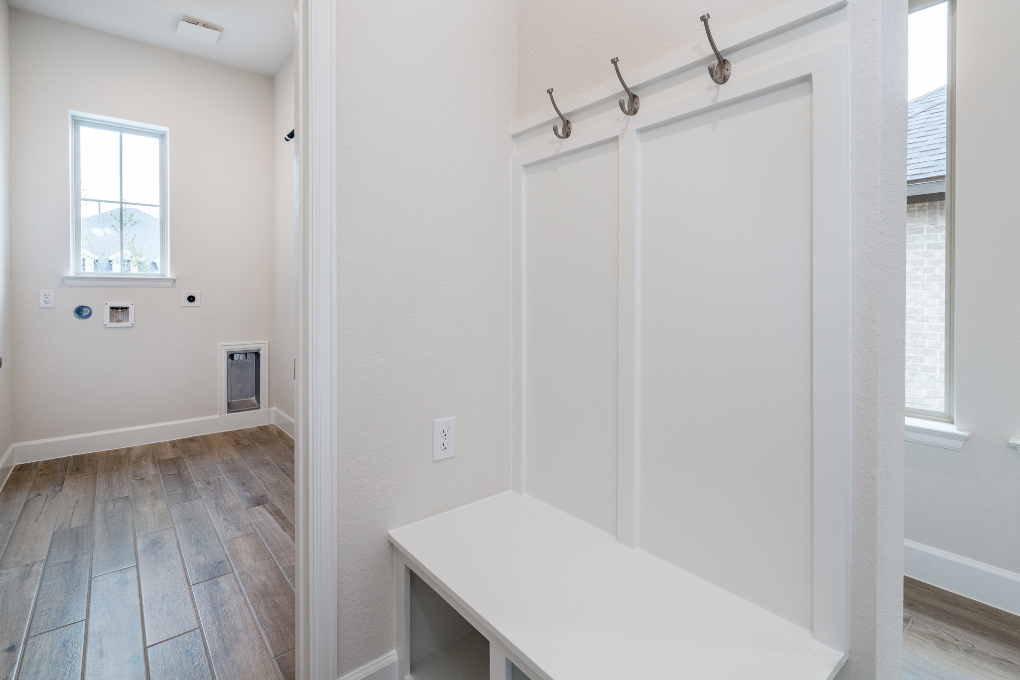 30314 Ruby Frst Court Magnolia, TX 77354 - Photo 23 of 29 a view of a hallway with wooden floor and closet