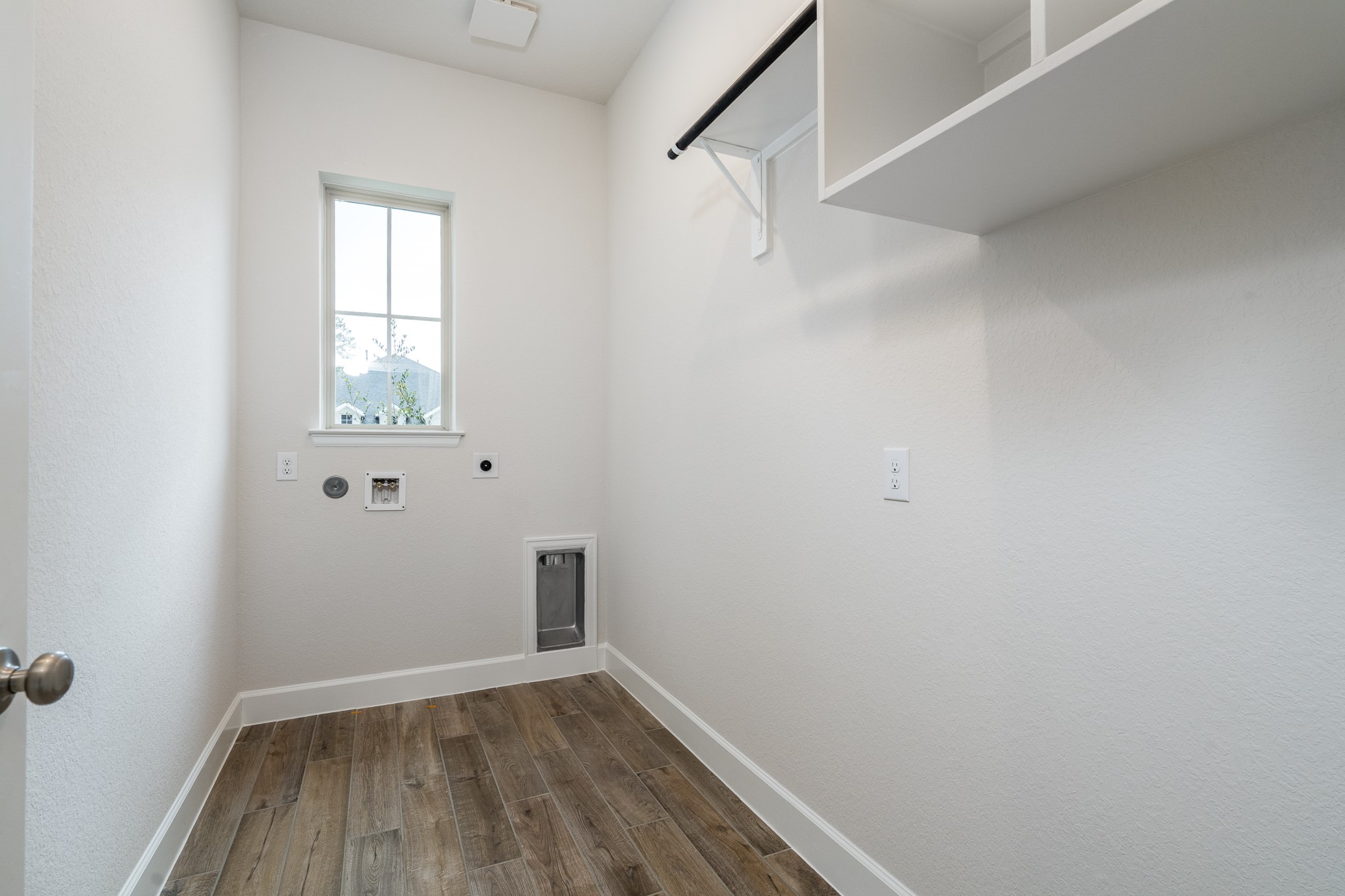 30314 Ruby Frst Court Magnolia, TX 77354 - Photo 24 of 29 a view of a room with wooden floor and windows