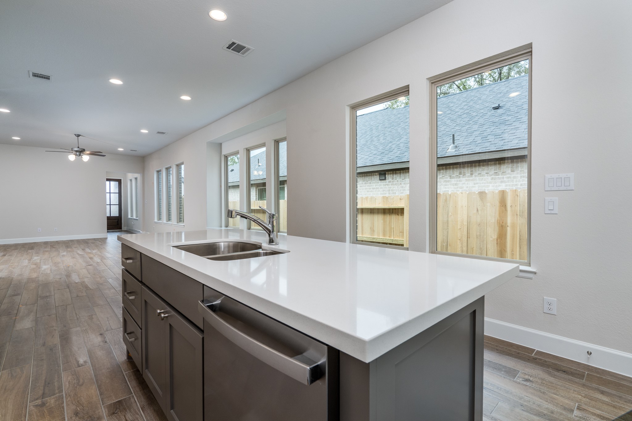 30314 Ruby Frst Court Magnolia, TX 77354 - Photo 10 of 29 a kitchen with a sink two cabinets and wooden floor