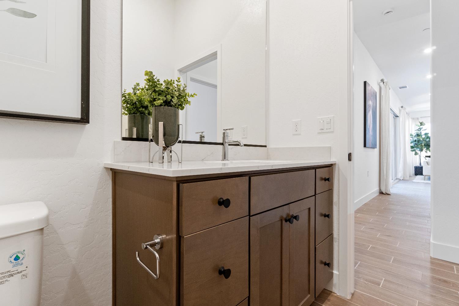 856 Traverse Drive Madera, CA 93636 - Photo 28 of 34 a bathroom with a sink and a mirror
