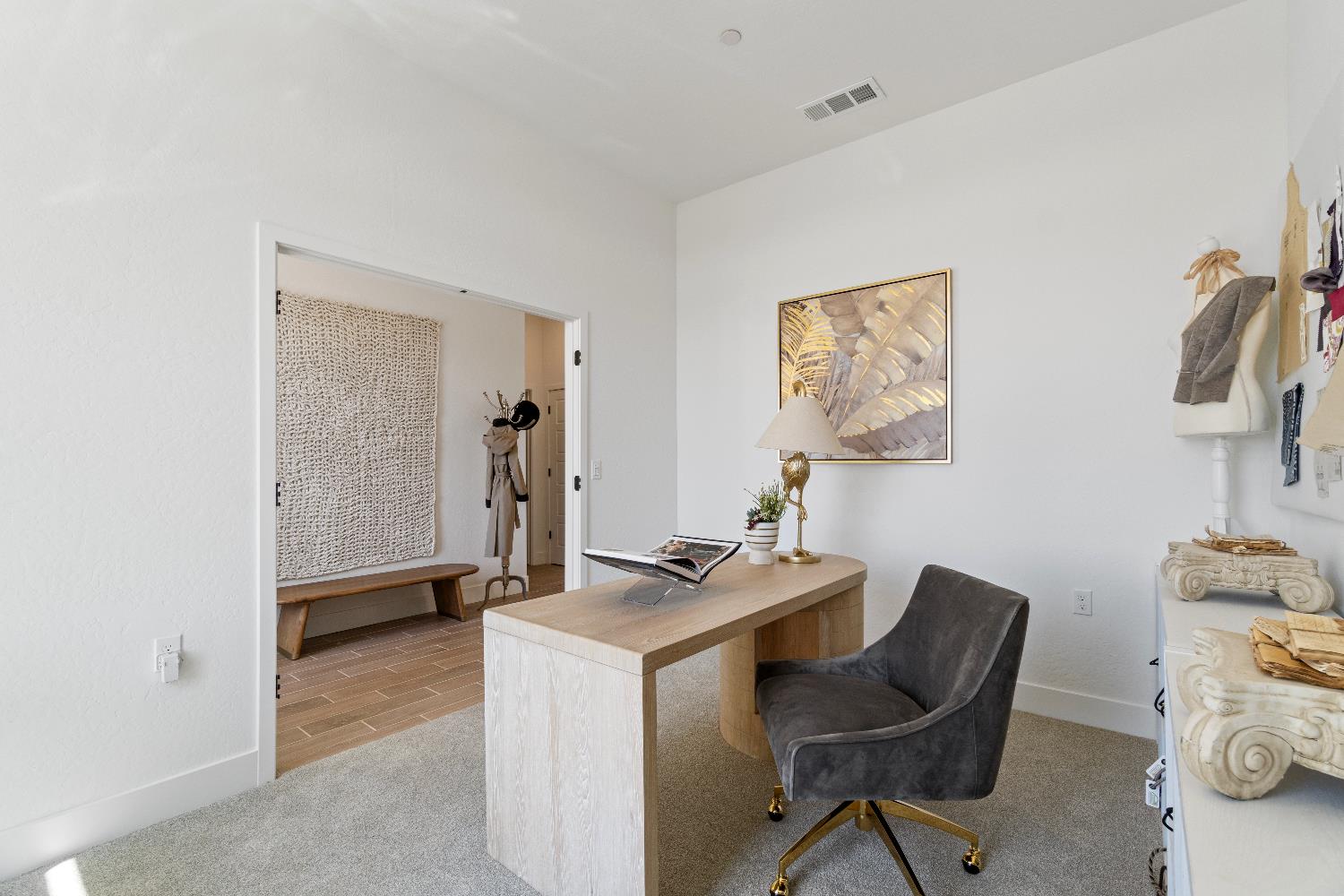 856 Traverse Drive Madera, CA 93636 - Photo 7 of 34 a work room with furniture and wooden floor