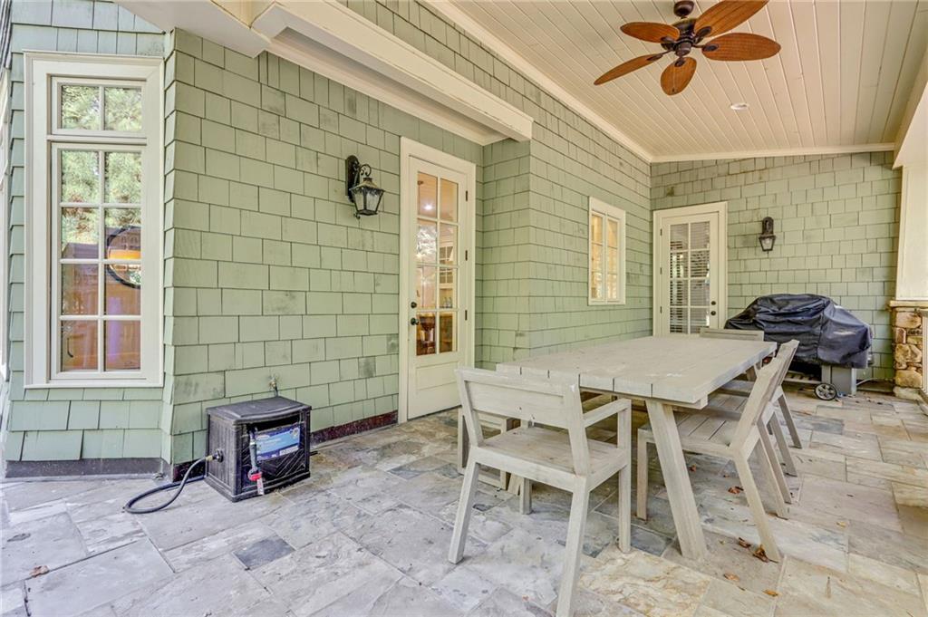 4227 Peachtree Dunwoody Road Atlanta, GA 30342 - Photo 42 of 44 a view of a dinning table and chairs in the room
