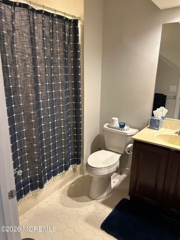 a bathroom with a sink and a toilet