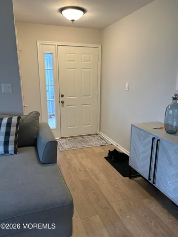 a bedroom with a bed and cabinets