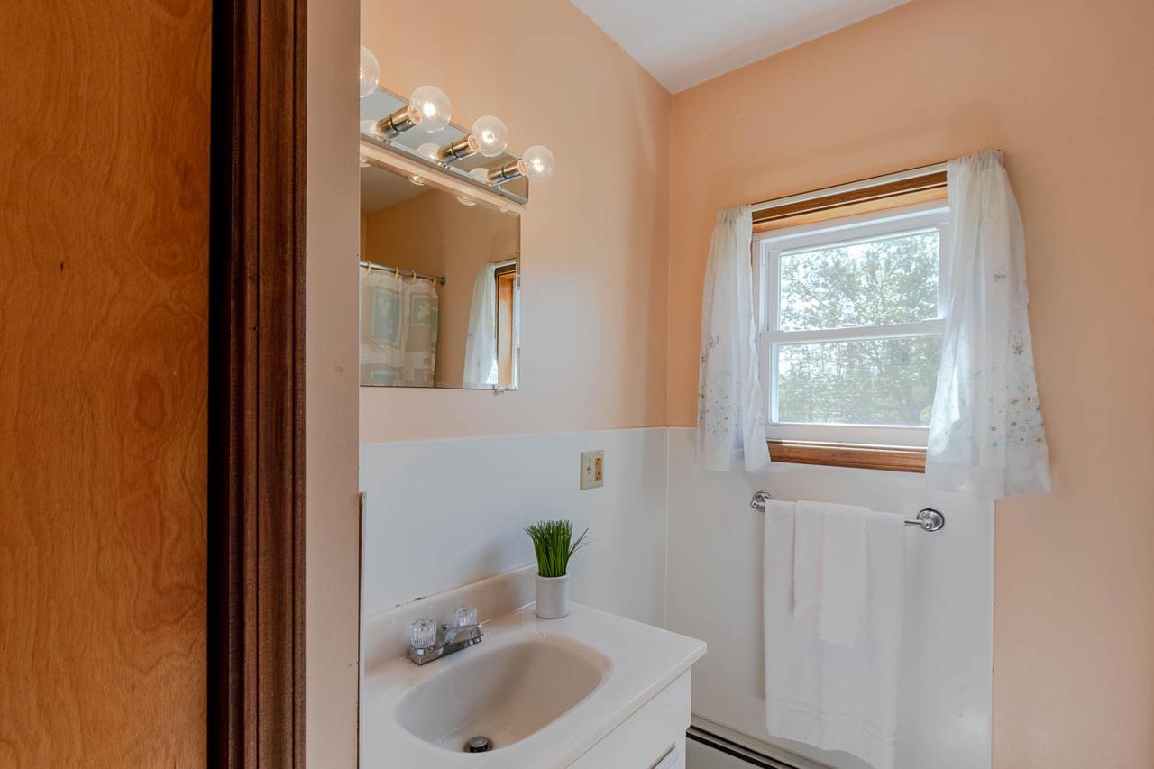 203 Gorton Road Moshannon, PA 16859 - Photo 15 of 39 a bathroom with a sink and a mirror