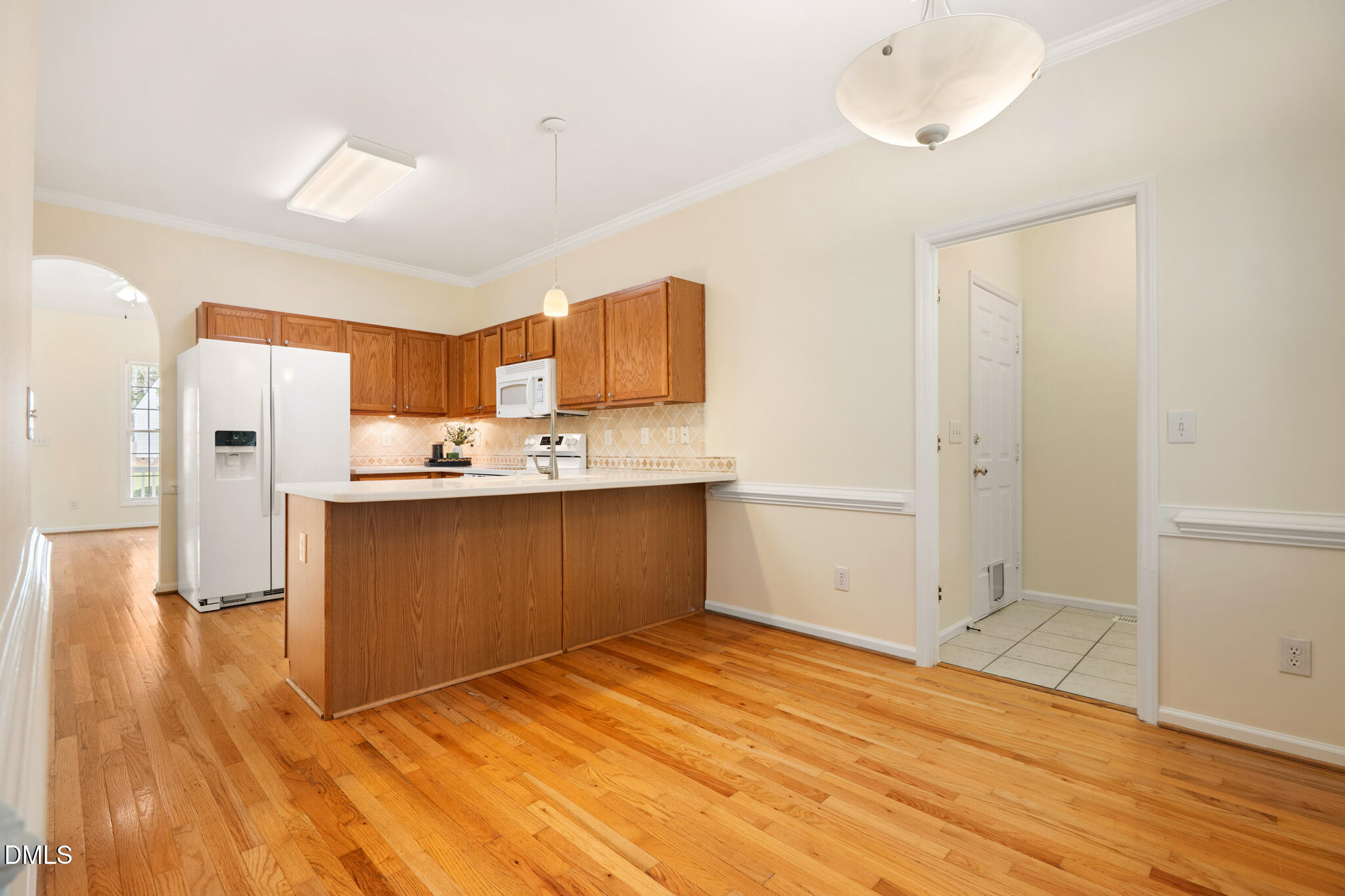 5604 Neuse Farm Drive Raleigh, NC 27616 - Photo 18 of 44 dining to kitchen