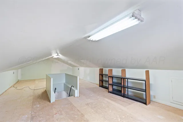 a swimming pool with yard and outdoor seating