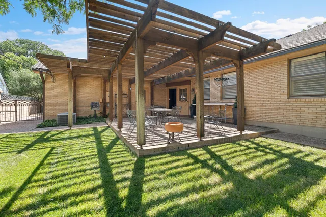 a backyard of a house with lots of green space