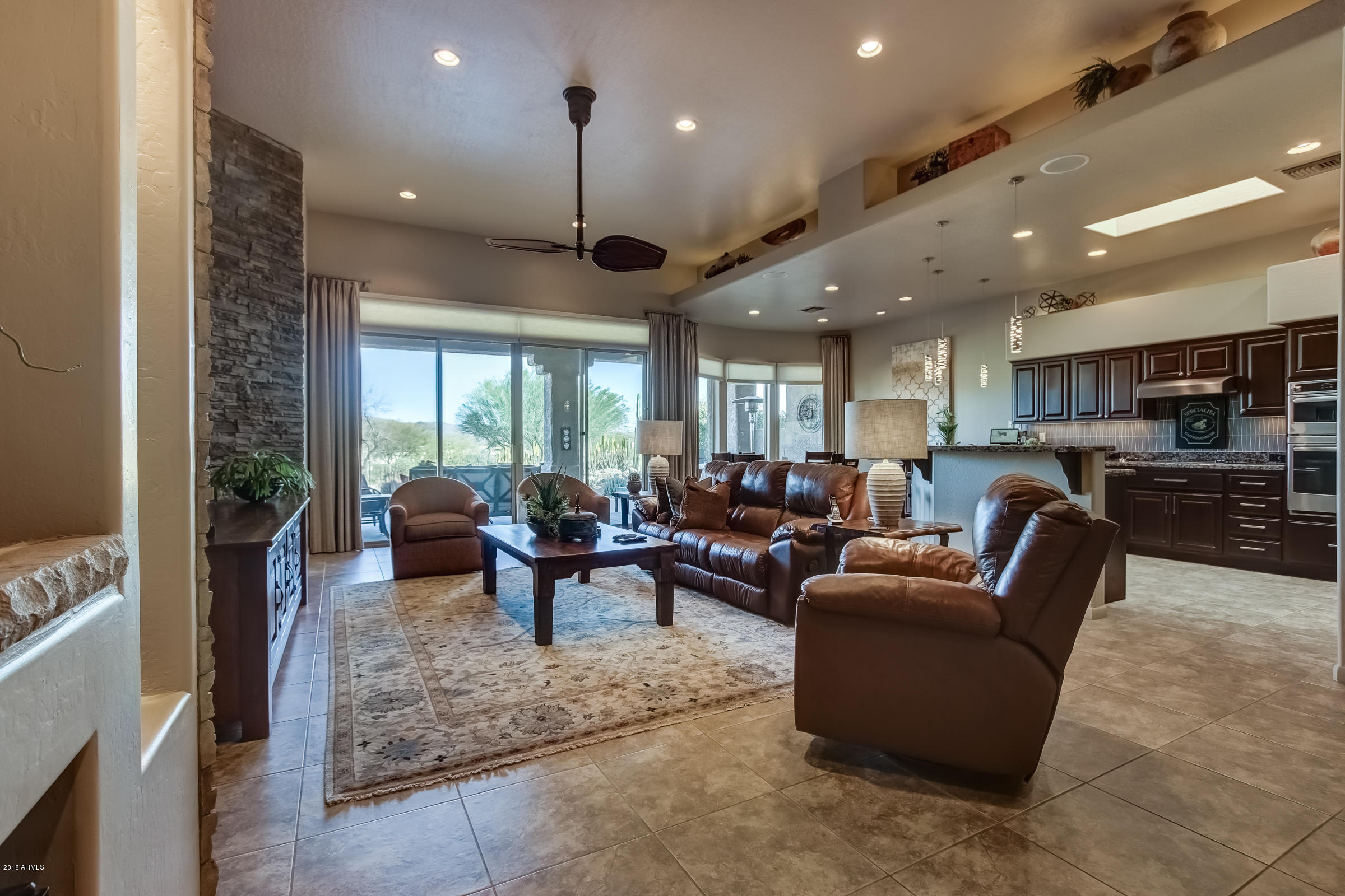 27833 North Granite Mountain Road Rio Verde, AZ 85263 - Photo 47 of 48 a living room with furniture and a large window