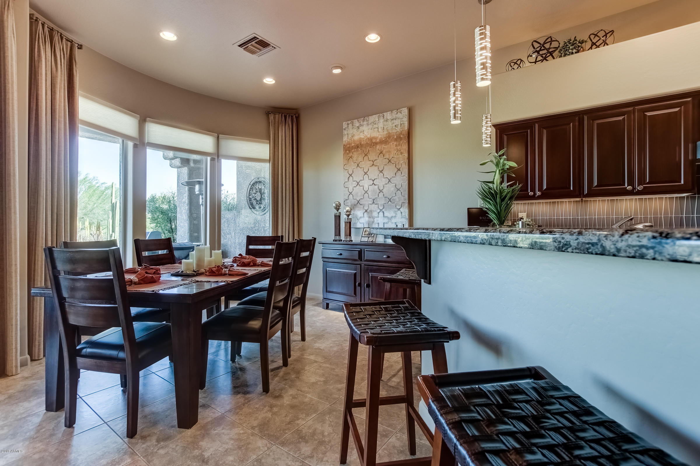 27833 North Granite Mountain Road Rio Verde, AZ 85263 - Photo 48 of 48 a kitchen with a table and chairs in it