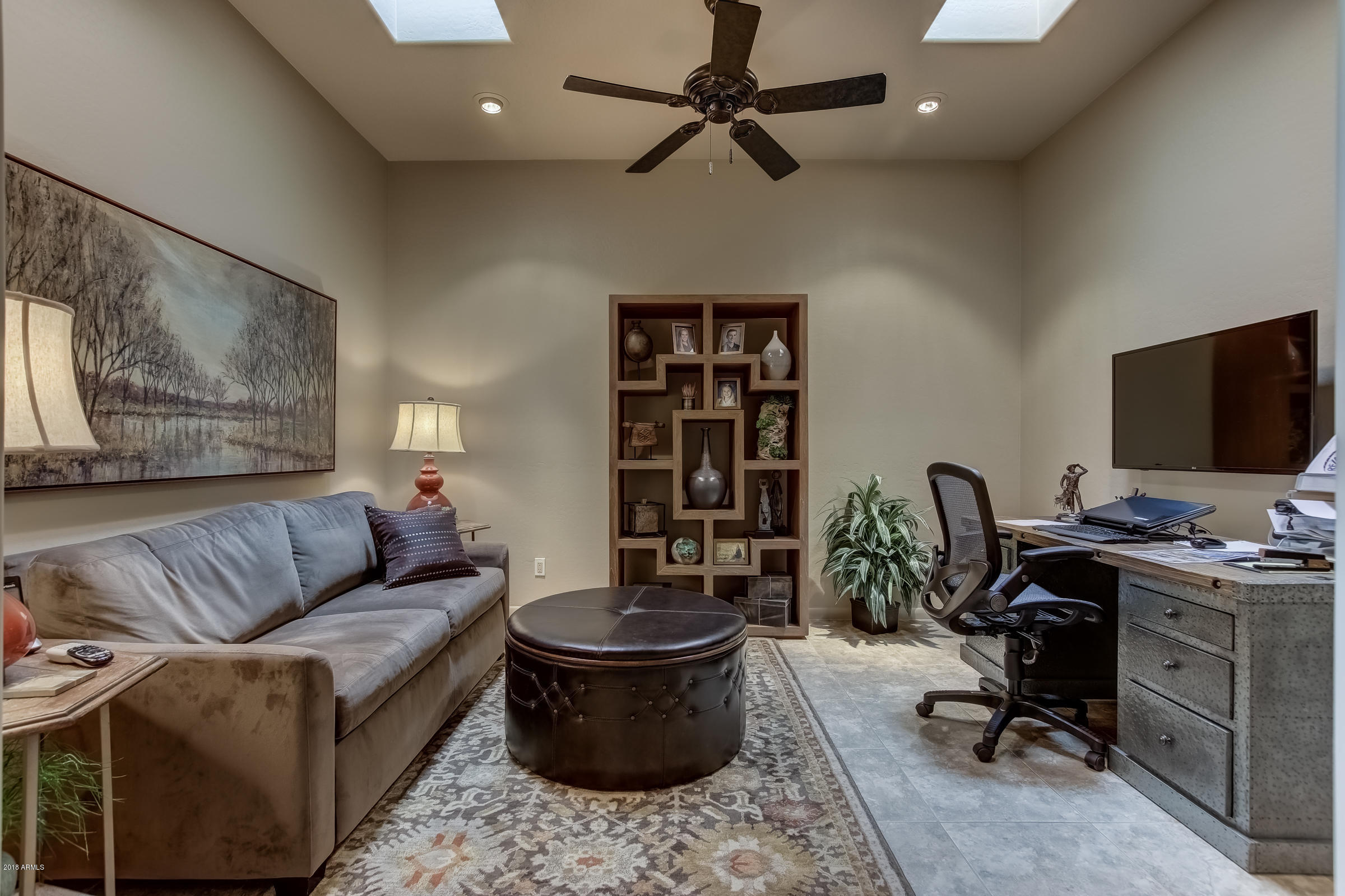 27833 North Granite Mountain Road Rio Verde, AZ 85263 - Photo 18 of 48 a living room with furniture and a flat screen tv