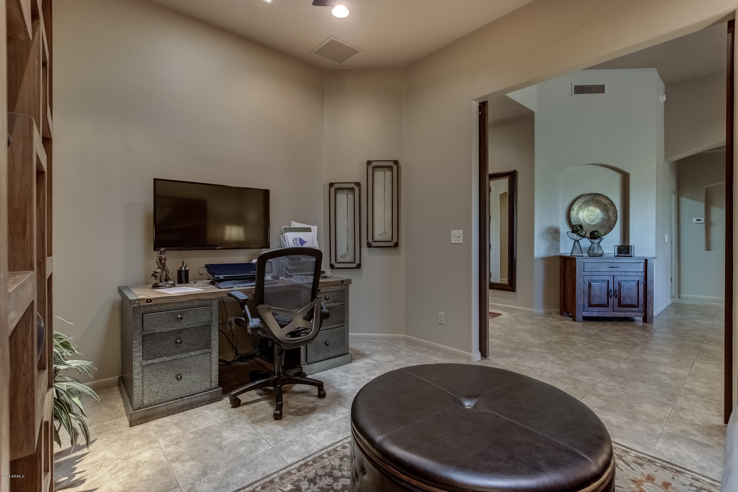 27833 North Granite Mountain Road Rio Verde, AZ 85263 - Photo 19 of 48 a view of a livingroom with furniture and a flat screen tv