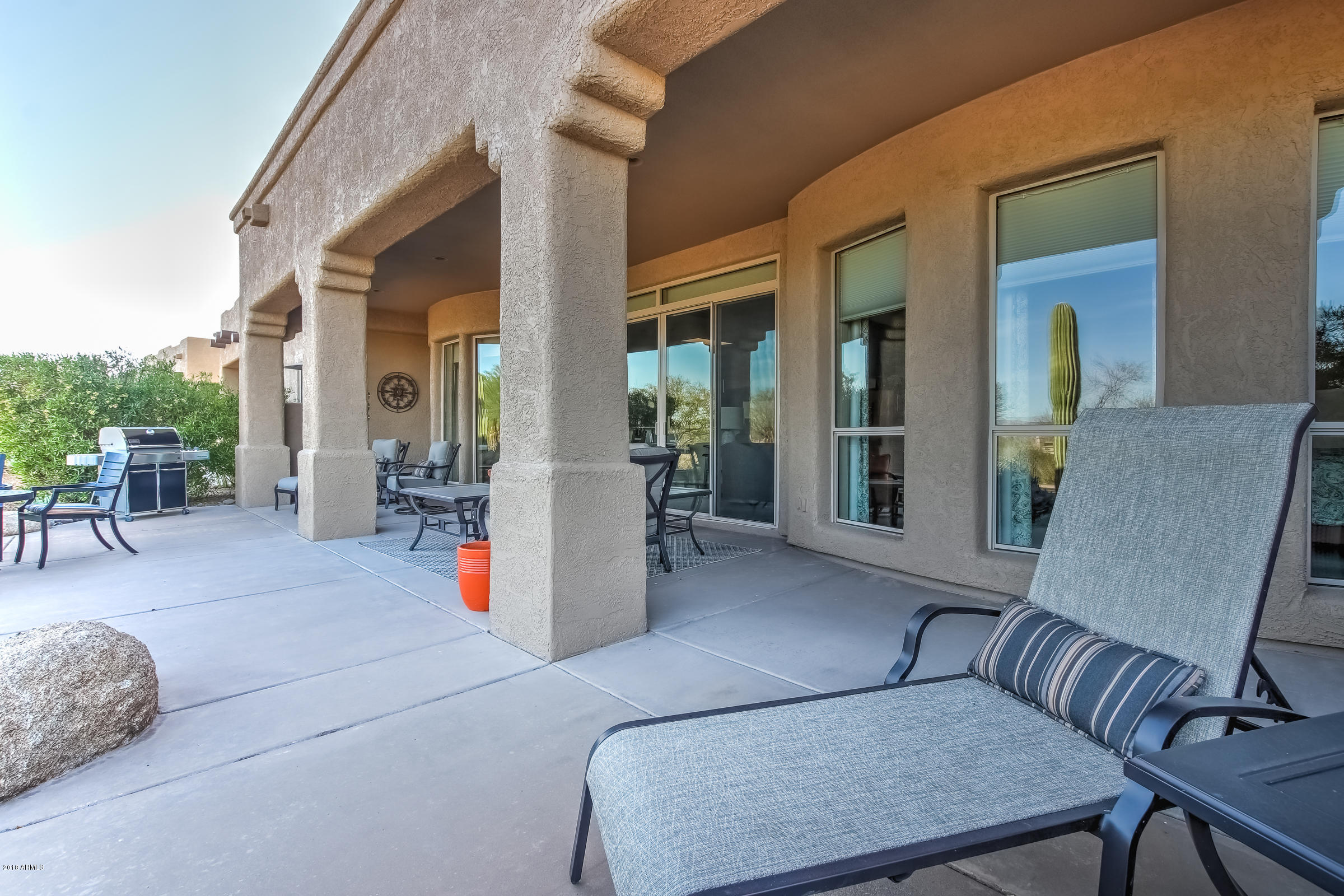27833 North Granite Mountain Road Rio Verde, AZ 85263 - Photo 32 of 48 a living room with furniture and wooden floor