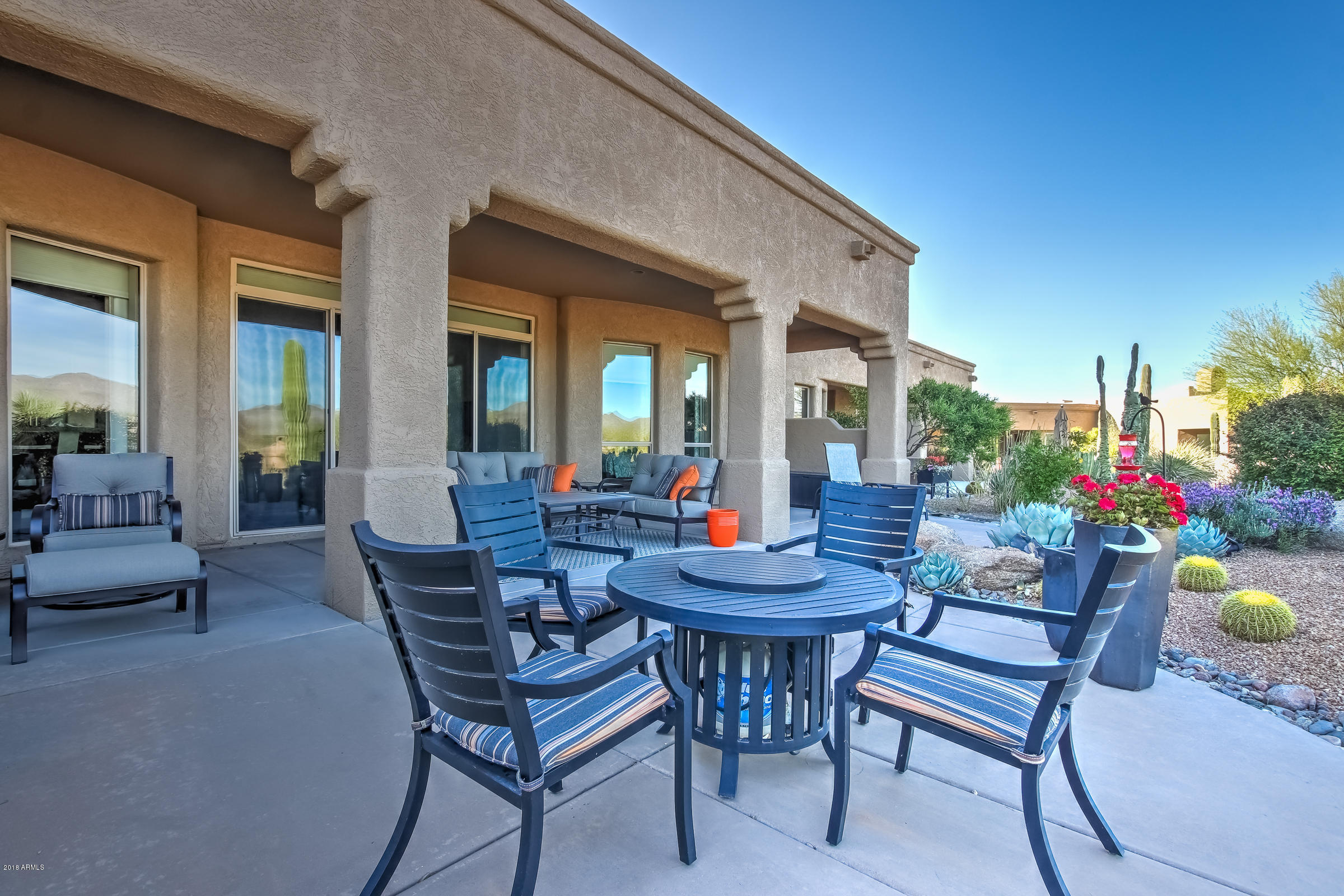 27833 North Granite Mountain Road Rio Verde, AZ 85263 - Photo 34 of 48 a outdoor space with a couch and chairs