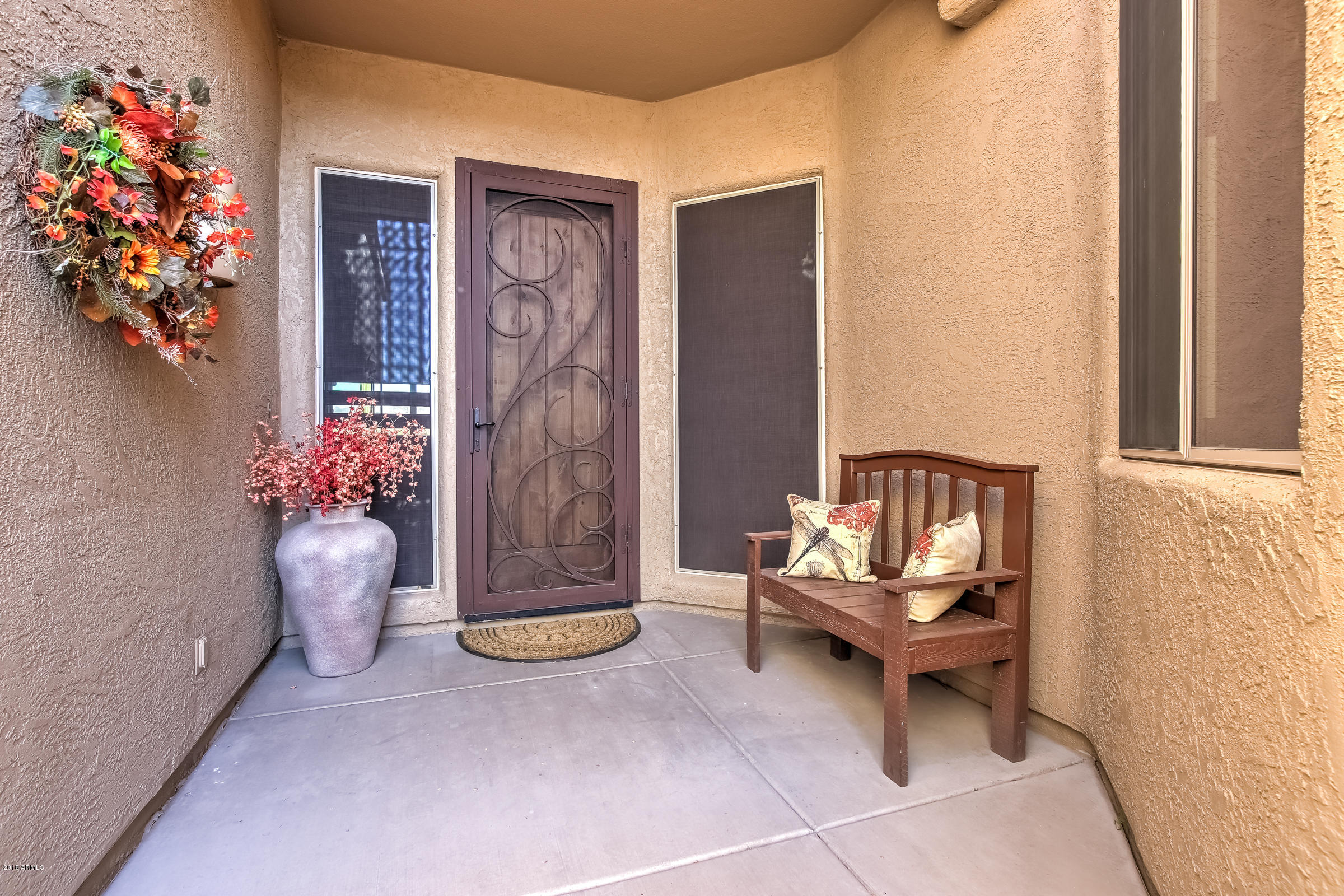 27833 North Granite Mountain Road Rio Verde, AZ 85263 - Photo 3 of 48 a living room with furniture and flowers