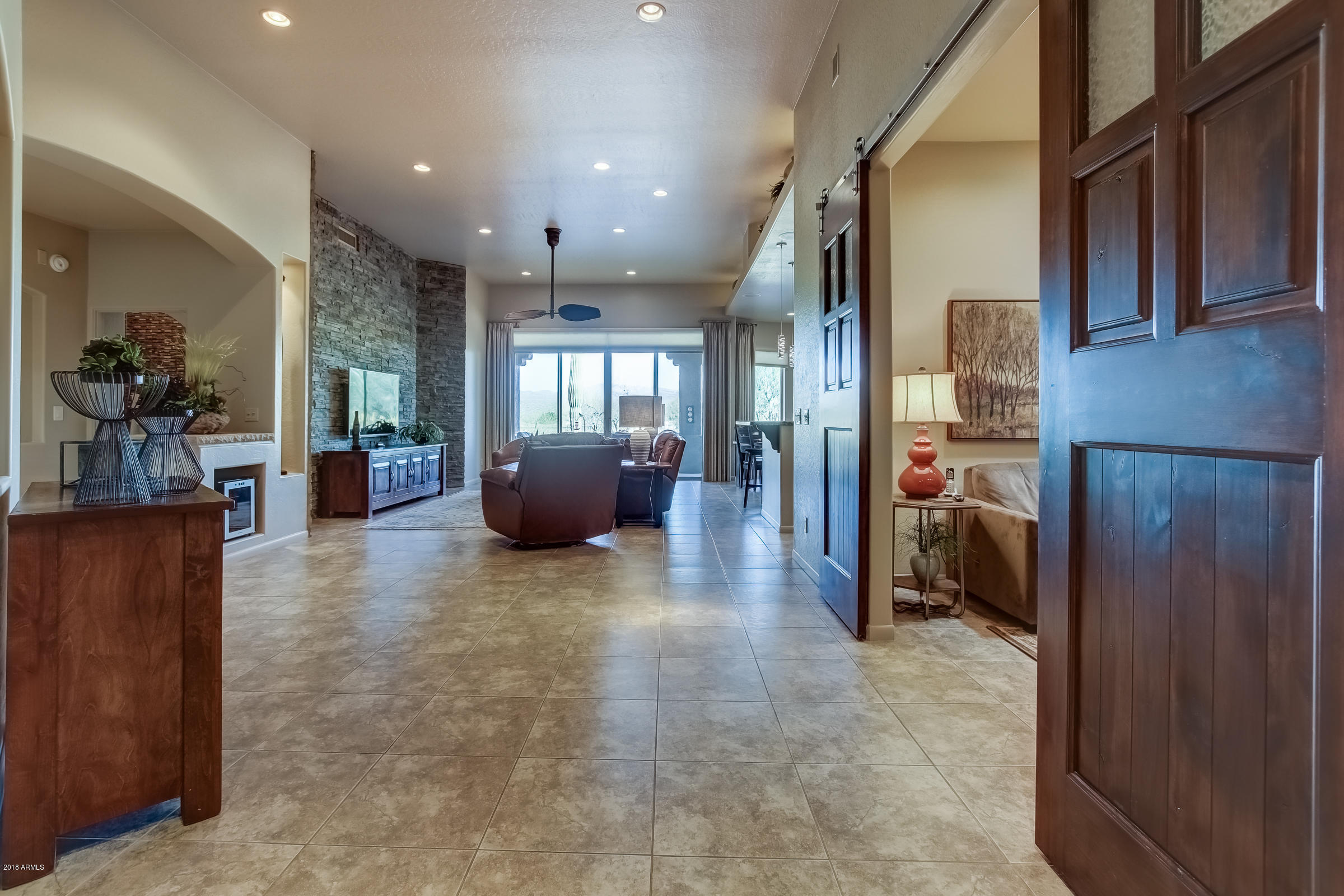27833 North Granite Mountain Road Rio Verde, AZ 85263 - Photo 4 of 48 a view of a hallway with living room and furniture