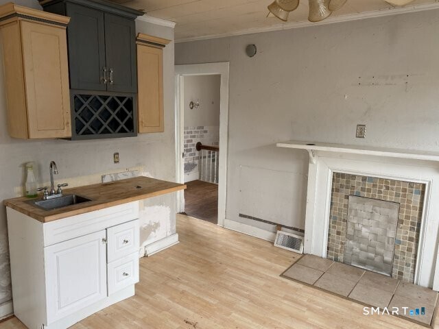 66 South 3rd Street Meriden, CT 06451 - Photo 11 of 12 a spacious bathroom with a granite countertop sink a mirror and a