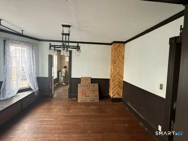 66 South 3rd Street Meriden, CT 06451 - Photo 4 of 12 a bedroom with furniture and window