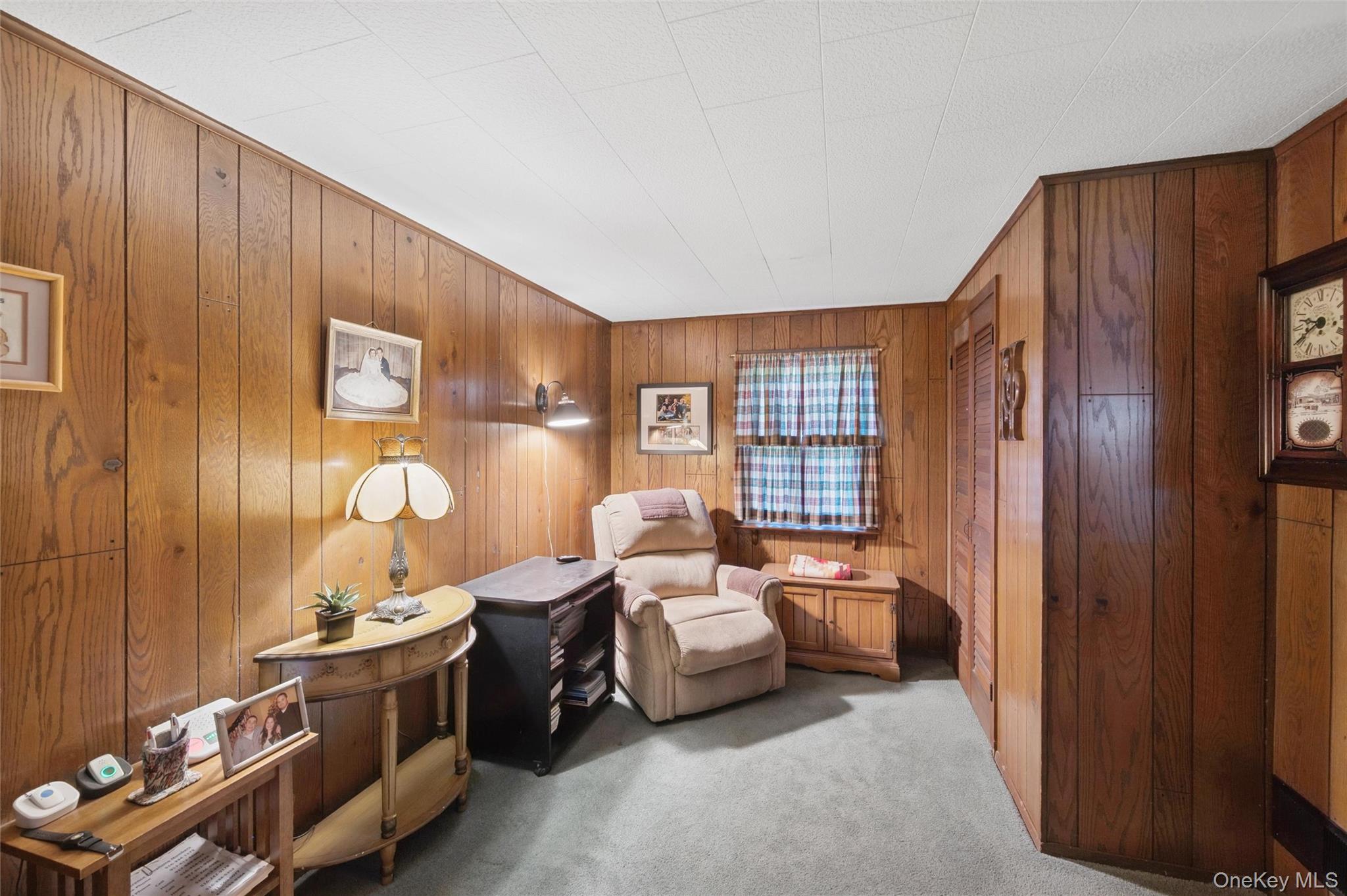 43 Briarcliff Road Westbury, NY 11590 - Photo 5 of 15 a room with furniture and window