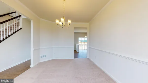 a view of livingroom with chandelier