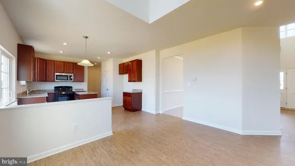 a kitchen with stainless steel appliances a refrigerator and a sink