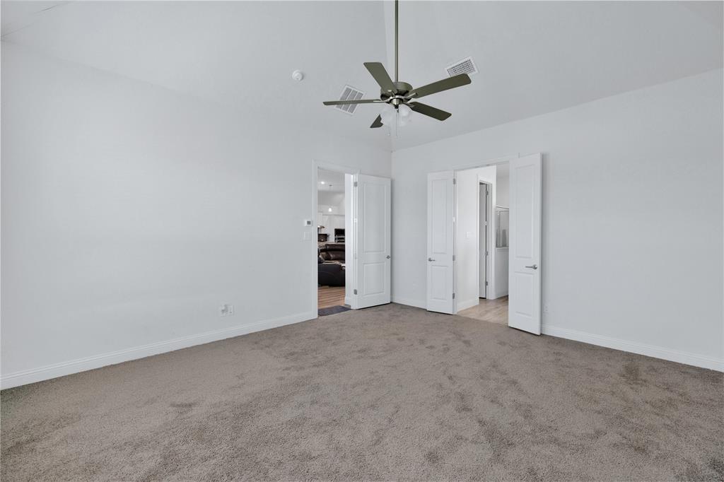 2307 Sam Street Mansfield, TX 76063 - Photo 12 of 23 Unfurnished bedroom featuring light colored carpet and ceiling fan