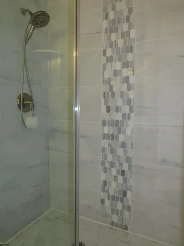 a bedroom with a bed and cabinets