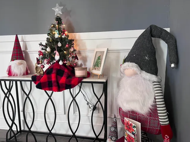 a kitchen with granite countertop white cabinets and stainless steel appliances