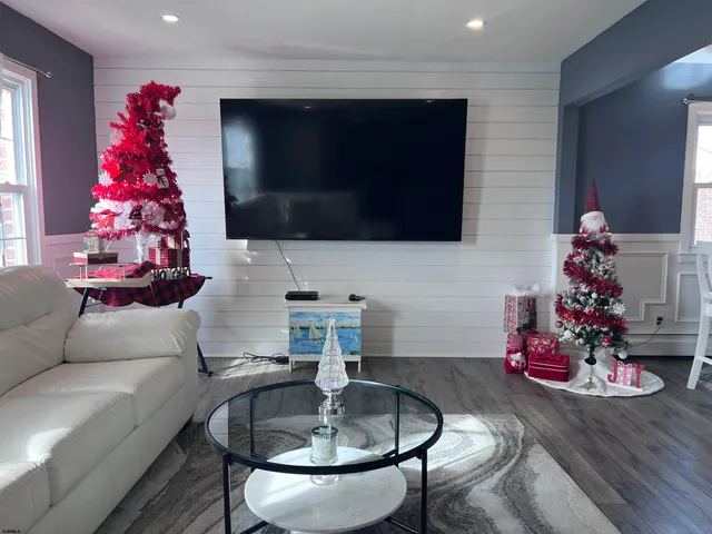 a kitchen with stainless steel appliances a stove a sink and a microwave