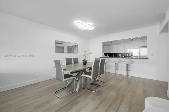 a workspace with furniture and wooden floor