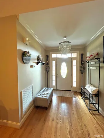 a view of a livingroom with furniture and wooden floor