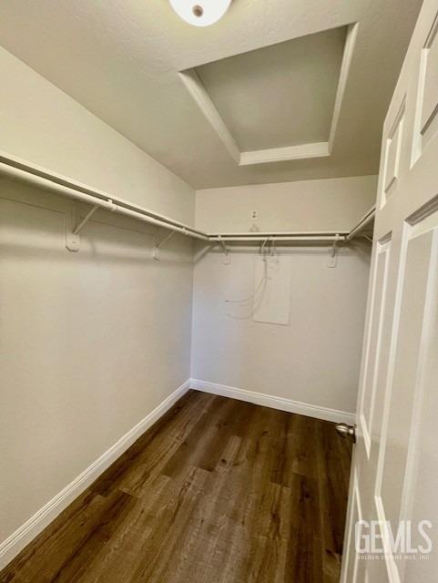 Undisclosed Address Bakersfield, CA 93313 - Photo 10 of 11 a view of a room with wooden floor