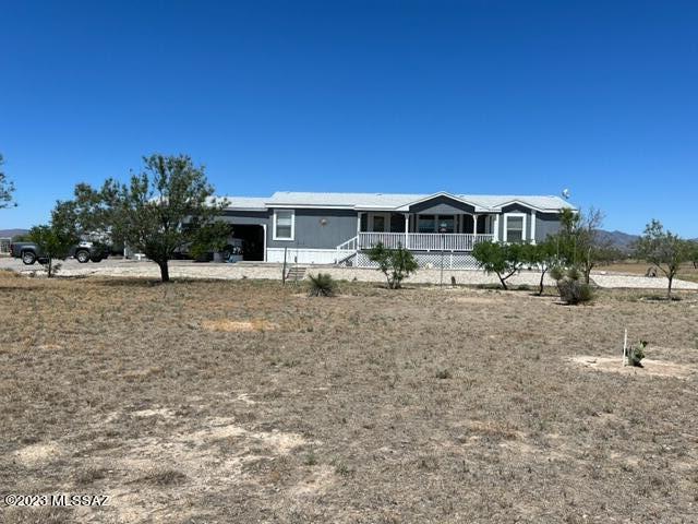 1343 Taylor Road Willcox, AZ 85643 - Photo 1 of 24 a view of a house with a yard