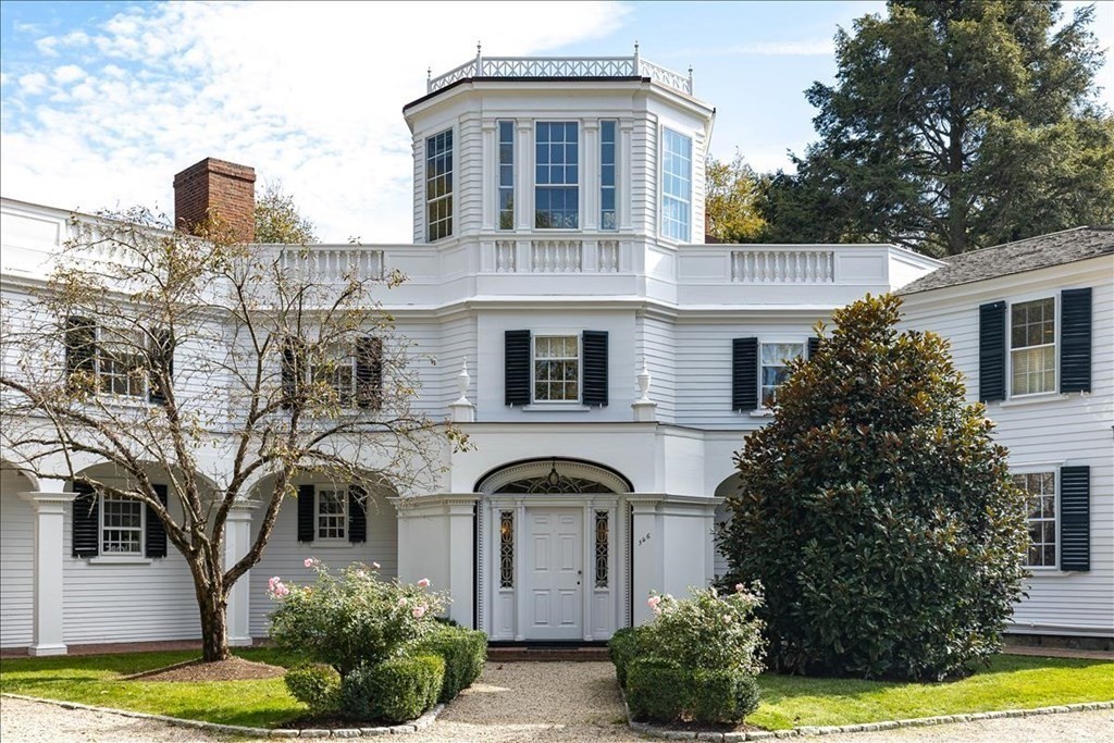346 Main Street Hingham, MA 02043 - Photo 1 of 42 a front view of a house with a garden