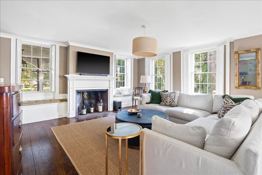 346 Main Street Hingham, MA 02043 - Photo 19 of 42 a living room with furniture and a fireplace