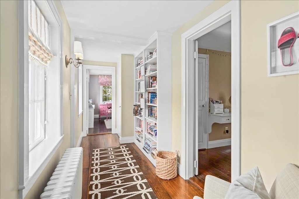 346 Main Street Hingham, MA 02043 - Photo 23 of 42 a view of a hallway with a livingroom and a dinning area