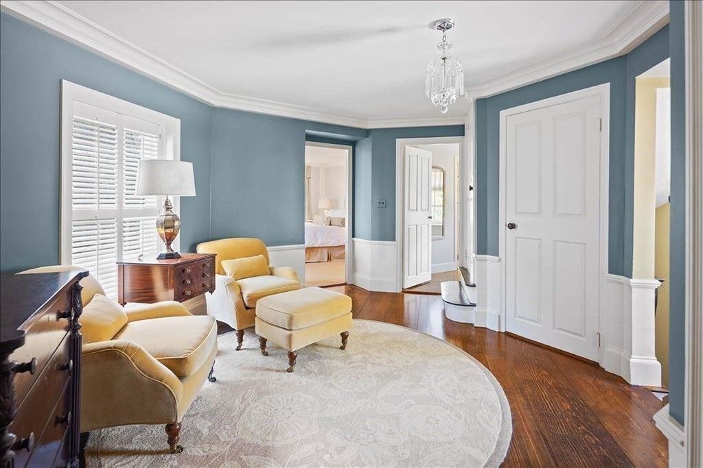 346 Main Street Hingham, MA 02043 - Photo 26 of 42 a spacious bedroom with a bed and wooden floor