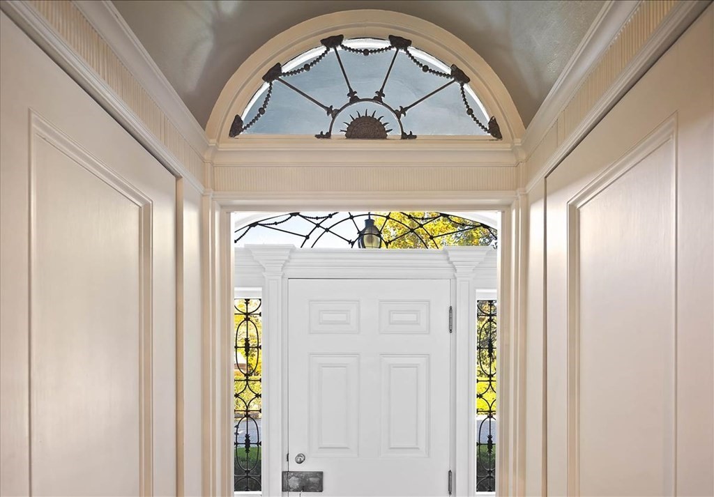 346 Main Street Hingham, MA 02043 - Photo 4 of 42 a view of front door with yellow lighting