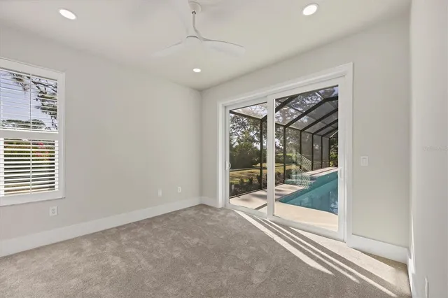 a view of a yard with a tree