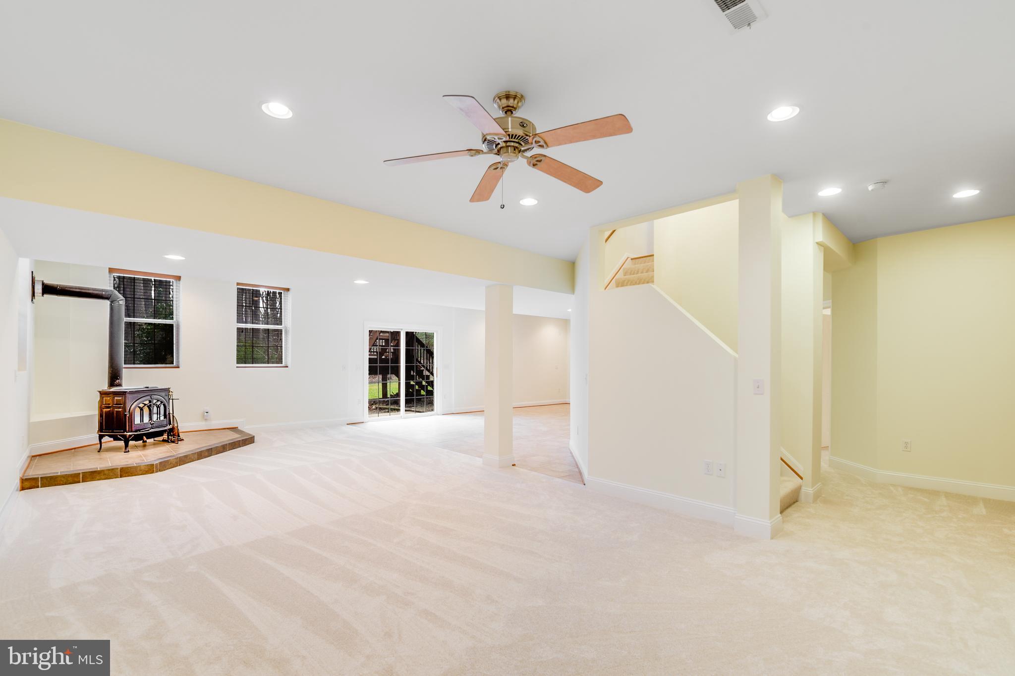 1175 Gum Bottom Road Crownsville, MD 21032 - Photo 38 of 54 Lower Level wood stove