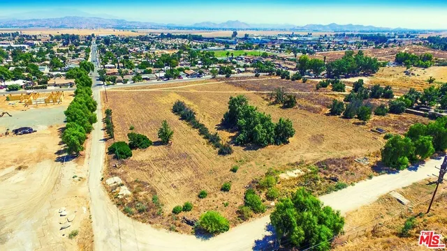a bathroom with a shower and a picture of a bathroom