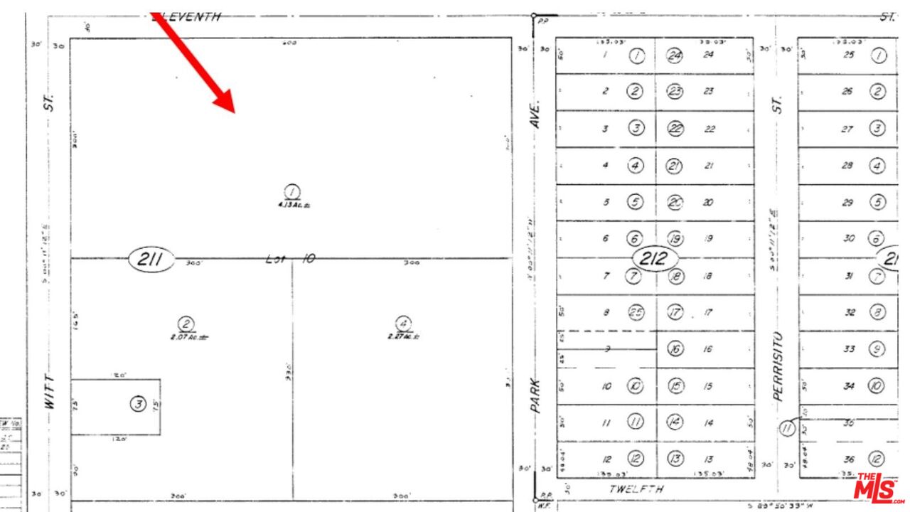 595 West 11th Street Perris, CA 92570 - Photo 7 of 7 a bathroom with a shower and a picture of a bathroom