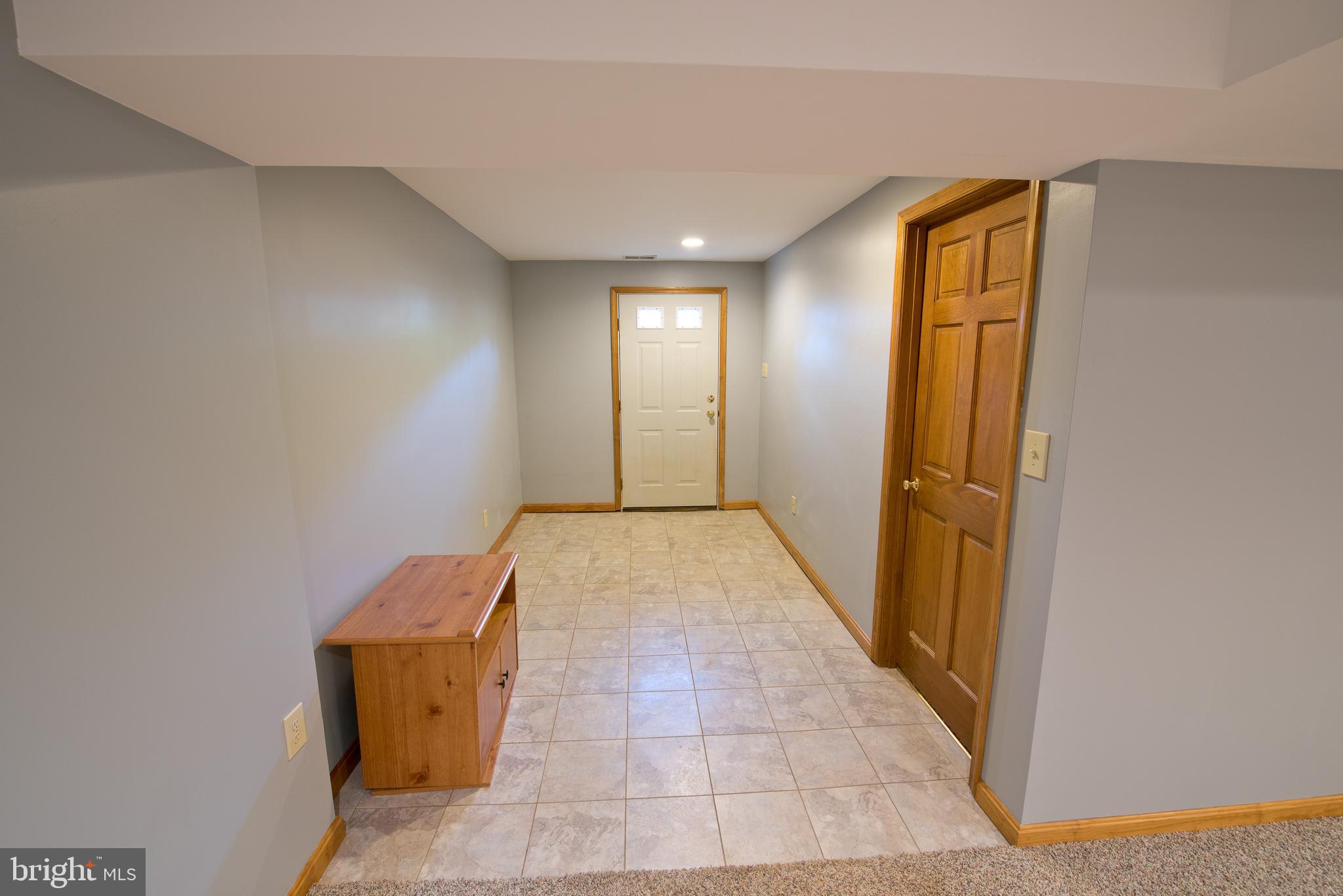 1819 Florence Road Mount Airy, MD 21771 - Photo 34 of 46 Tiled area inside door to walkup