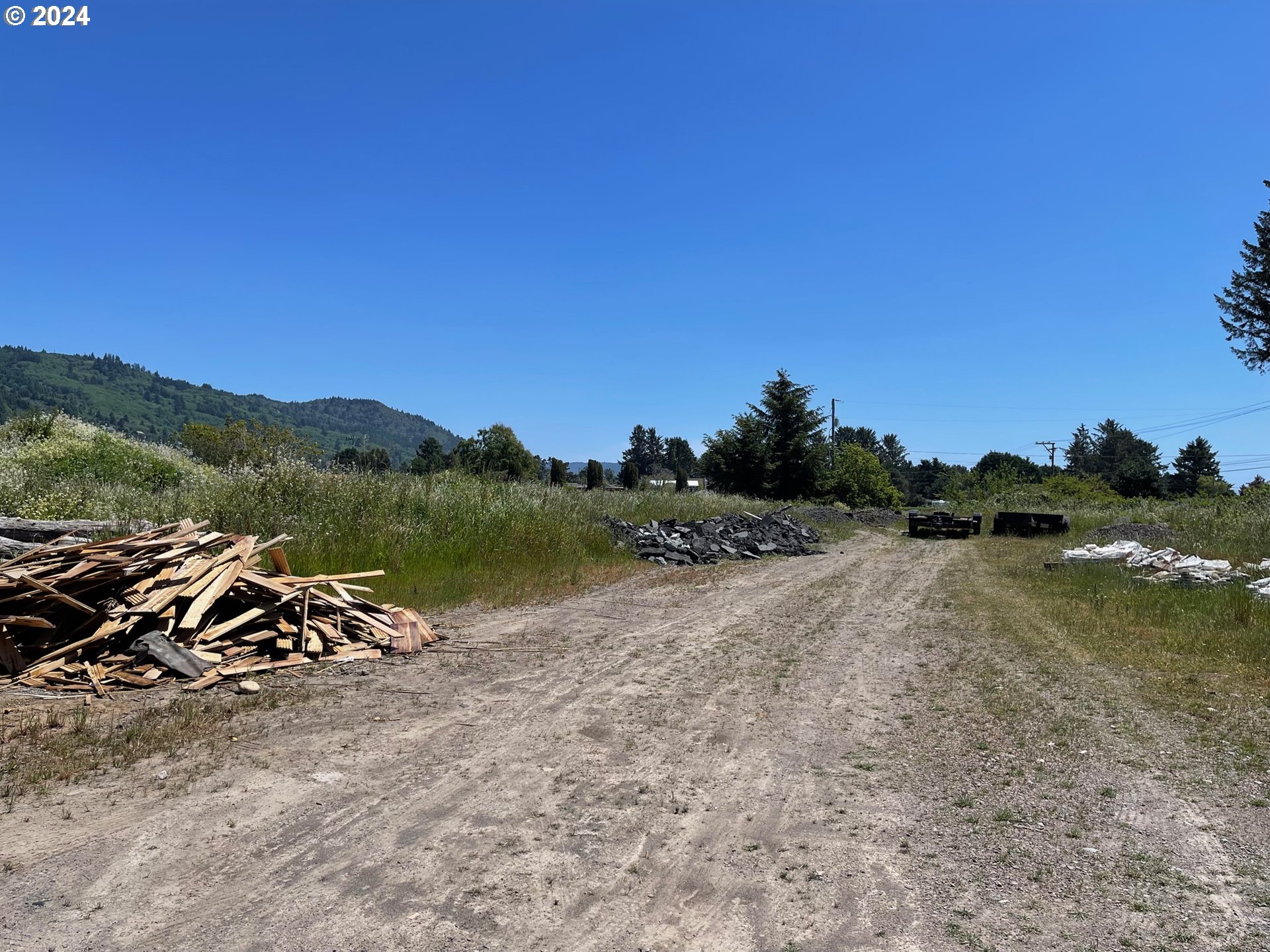 Oceanview Drive Brookings, OR 97415 - Photo 6 of 12 a view of a lake in middle of forest