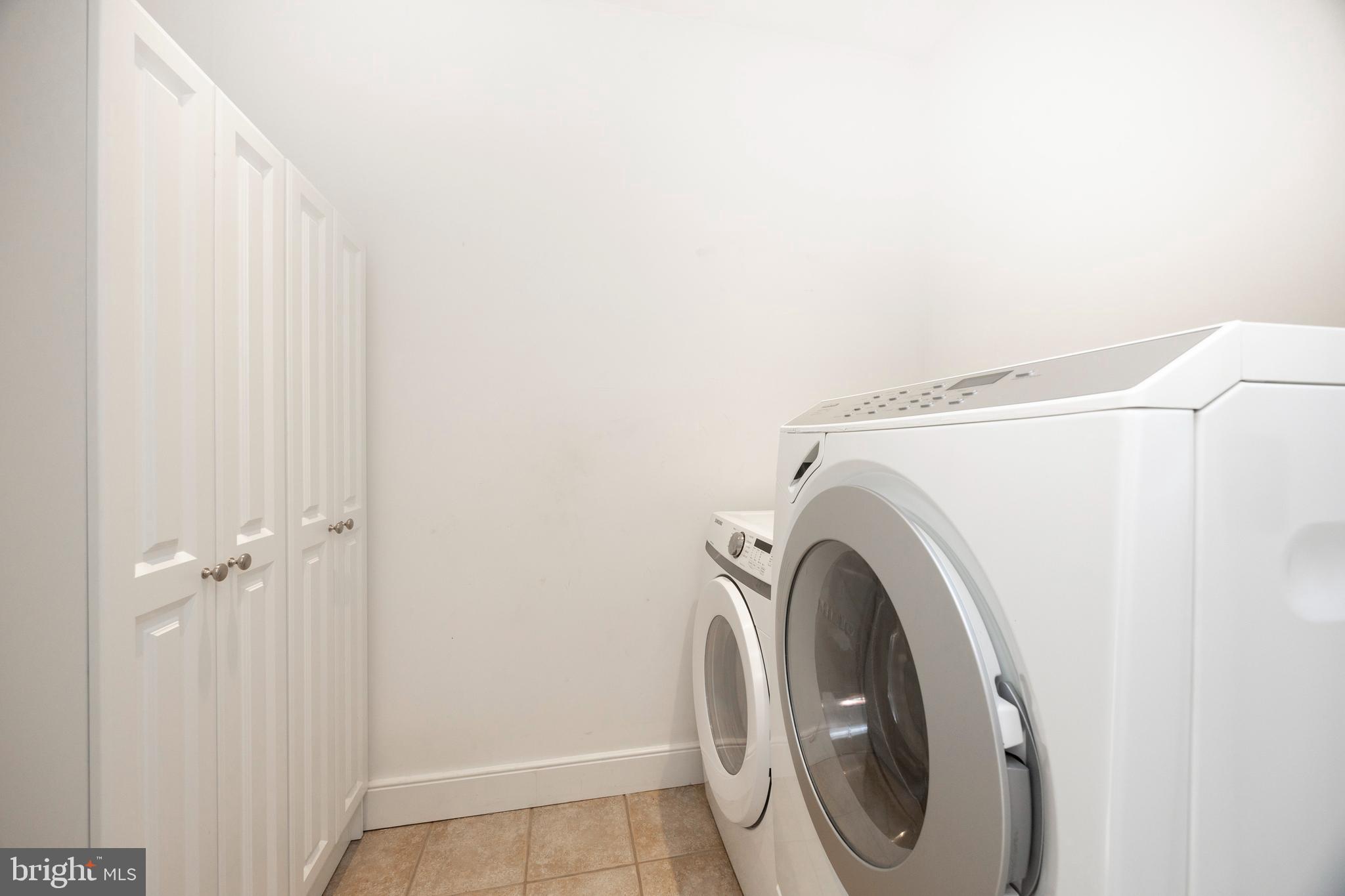 115 Bullock Road Chadds Ford, PA 19317 - Photo 32 of 50 a utility room with dryer and washer