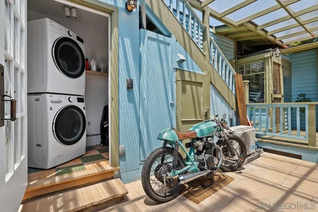 a view of a room with washer and dryer