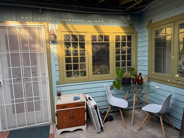 a kitchen with stainless steel appliances granite countertop a stove and a wooden floors