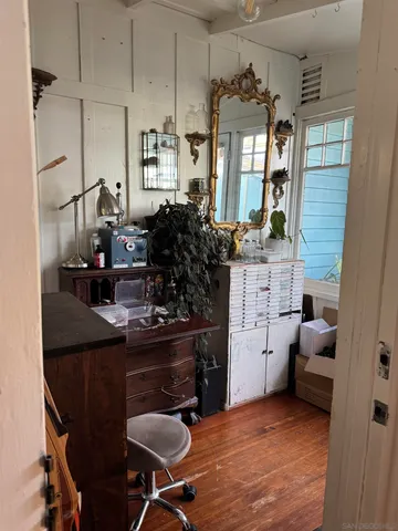 a kitchen with stainless steel appliances granite countertop a sink a stove and cabinets