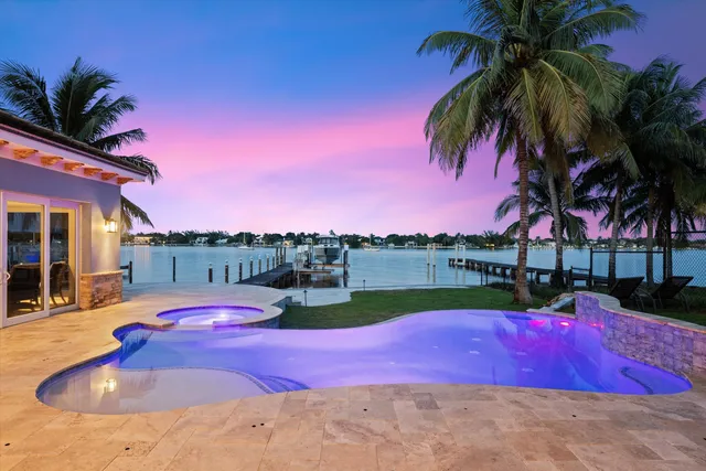 a view of swimming pool with outdoor seating